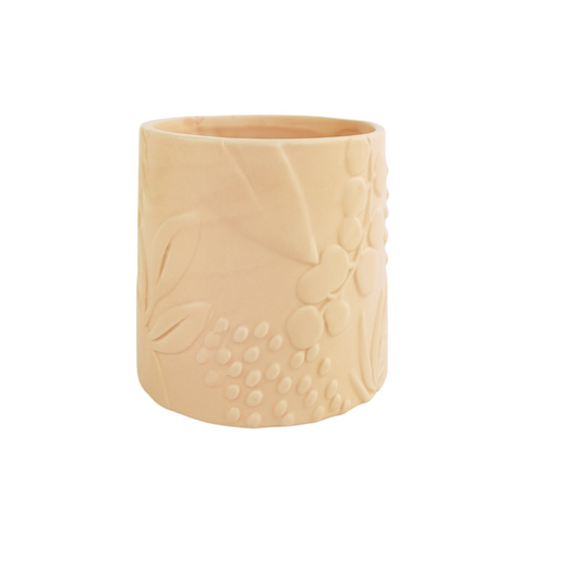 Beige ceramic planter with embossed design on a white background