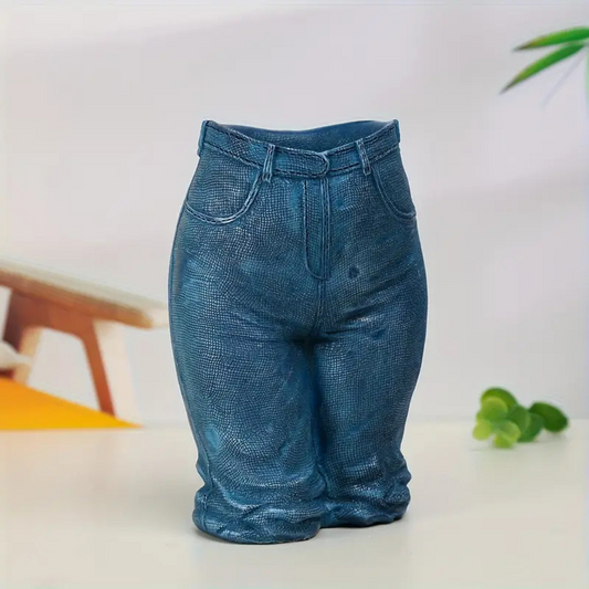 Blue jeans shaped Planter a white surface with a blurred background